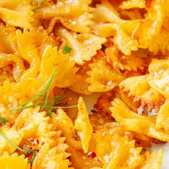 air-fryer-pasta-chips-recipe Air fryer pasta chips recipe. Learn how to cook cheesy pasta chips in an air fryer. Yummy appetizer! #airfryer #chips #pasta #appetizer #easy #crispy