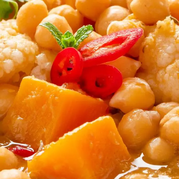 slow-cooker-vegetable-and-chickpea-stew-recipe Slow cooker vegetable and chickpea stew recipe. This hearty and healthy stew is perfect for the colder months. #slowcooker #crockpot #vegan #healthy #vegetarian #stew