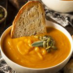 Air fryer butternut squash soup recipe. This butternut squash soup is a perfect vegan soup for the fall season. With just four ingredients, this recipe is sure to please everyone in your family. #airfryer #soup #dinner #healthy #easy #vegetarian