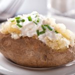 Air fryer baked potatoes recipe. Air fryer baked potatoes are a healthy, delicious meal made with just a few ingredients in your air fryer. #airfryer #dinner #potatoes #healthy #easy #vegetarian