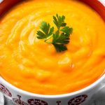 Slow cooker creamy carrot soup recipe. Tired of the same old soup recipes? Skip the cans and try a creamy carrot soup. It's not too spicy or sweet, but you can customize it to your liking. #slowcooker #crockpot #soups #healthy #vegetarian #vegan #creamy