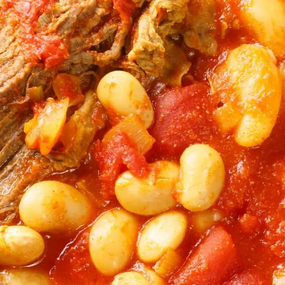 slow-cooker-moroccan-bean-stew-recipe Slow cooker Moroccan bean stew recipe. Looking for a delicious meal that cooks itself? This Moroccan bean stew is a hearty and flavorful slow cooker recipe.#slowcooker #crockpot #beans #stew #healthy #homemade