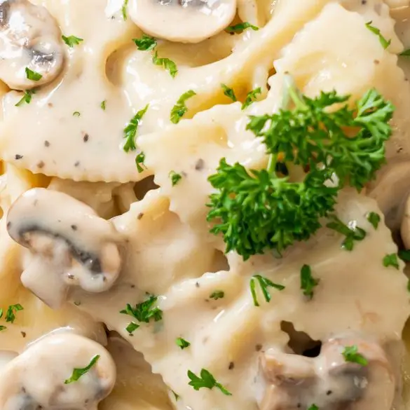 Instant pot farfalle pasta with mushrooms and cream. Farfalle pasta is a type of ribbon-shaped, flat noodle that comes in a variety of shapes and colors. #instantpot #pressurecooker #pasta #homemade #dinner #easy #delicious