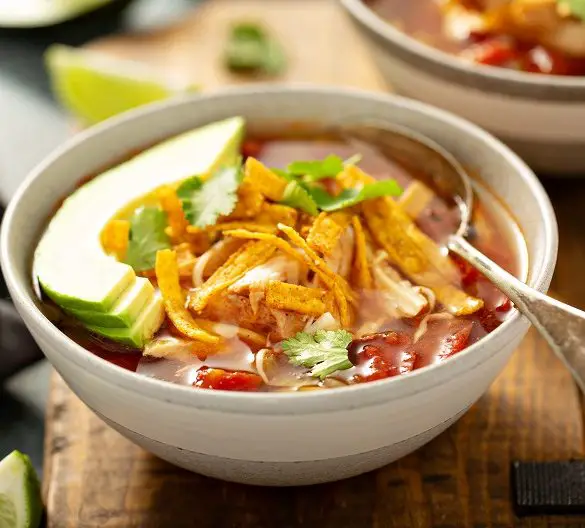 Slow cooker chicken taco soup recipe. This chicken taco soup recipe is a family favorite. The best part is that it's super easy to make! #slowcooker #crockpot #chicken #mexican #taco #soups #dinner #homemade