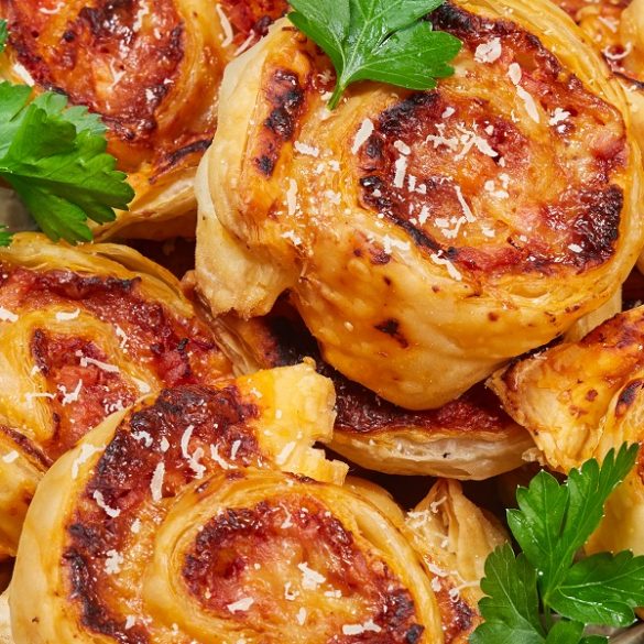 Air fryer ham and cheese pinwheels. Delicious and crispy ham, melted cheese, and mustard make these pinwheels the perfect treat for any occasion. #airfryer #pinwheels #breakafst #homemade #recipes #ham #cheese