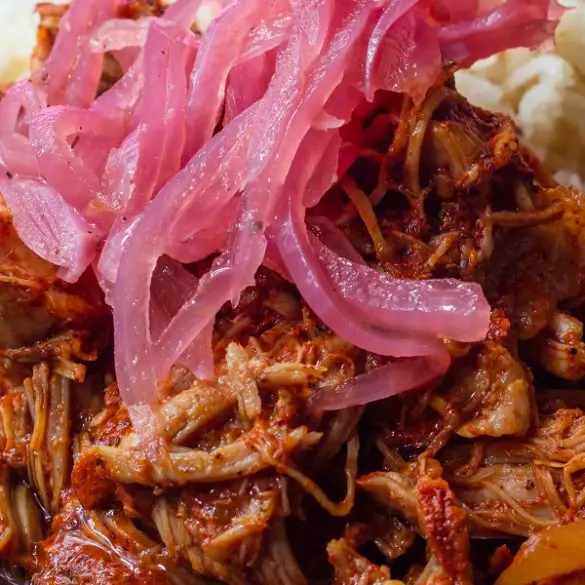 Slow cooker cochinita pibil. This cochinita pibil is one of the most popular dishes in all of Mexico. #slowcooker #crockpot #pork #reipes #dinner #homemade
