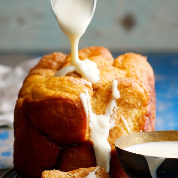 Slow cooker monkey bread is an easy recipe for bread that is cooked in a crockpot! This monkey bread also has cinnamon, maple syrup, and eggs. #slowcooker #crockpot #bread #homemade #recipes #breakfast #desserts